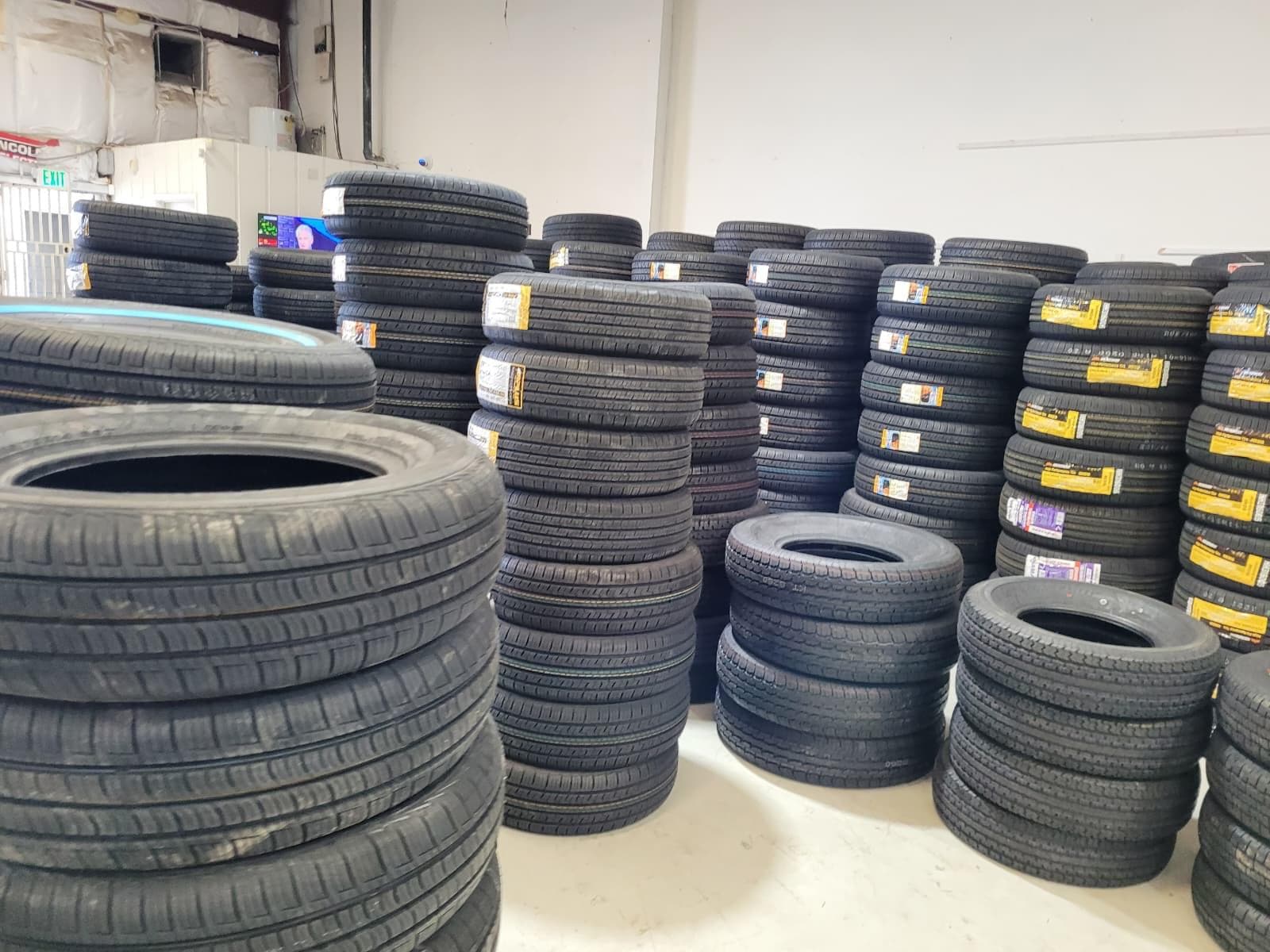 Eagle Tires stacked in shop